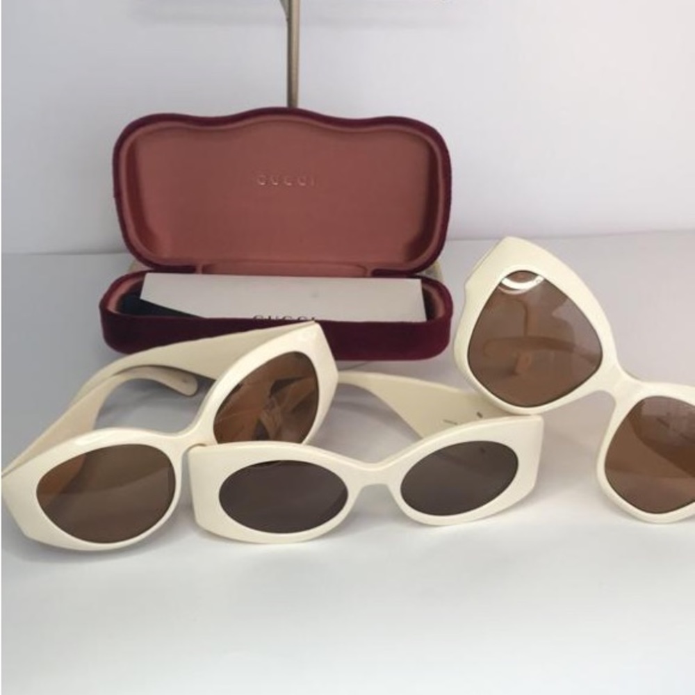 GUCCI GG0809S 002 cat eye sunglass comes in a ivory frame with brown lenses. - Picture 10 of 15
